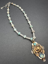 Load image into Gallery viewer, Bronze lion with aquamarine
