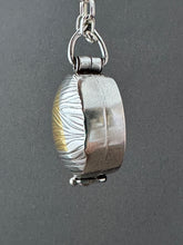 Load image into Gallery viewer, Textured oval flower locket.

