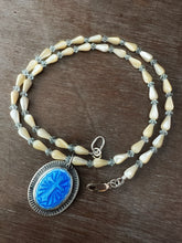 Load image into Gallery viewer, Enameled cross on a beaded mother of pearl and crystal necklace.
