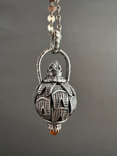 Load image into Gallery viewer, Vintage crystal and carnelian dragon egg medallion
