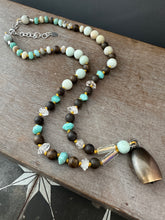 Load image into Gallery viewer, Handmade Bronze Bell on Hand Knotted Silk Beaded (long necklace)

