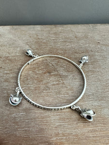 Sterling silver patterned Jingle bangle