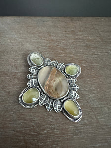 Mossy agate and green rutilated quartz medallion