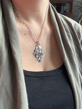 Load image into Gallery viewer, Bronze lion with aquamarine
