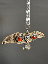 Load image into Gallery viewer, Bronze and silver stamped bird pendant with garnets
