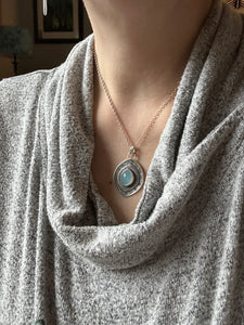 Layered silver and Aquamarine eye pendant