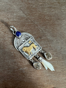 Golden Lion with Herkimer quartz, lapis, and a shell hand