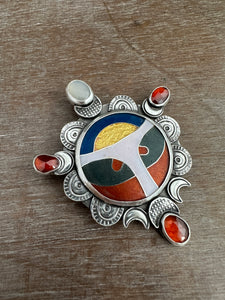 Cloisonné glass enamel with garnets and moonstone