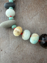 Load image into Gallery viewer, Beachy Bead collection hand knotted on red silk.
