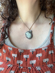 Fairy stone and vesuvianite crystal pendant