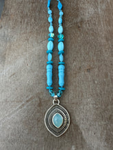Load image into Gallery viewer, Layered silver and Aquamarine eye pendant with hand knotted vintage glass beads
