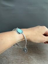 Load image into Gallery viewer, Sterling silver Jingle bangle with sapphire and Peruvian opal
