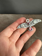 Load image into Gallery viewer, Large stamped bird pendant with a Winza Sapphire and garnet.
