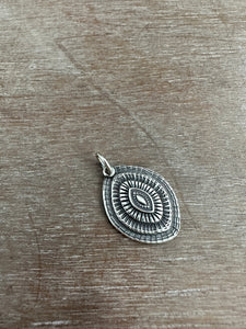 Layered silver eye pendant