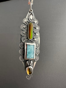 Multi stone pendant with Synthetic opal, Larimar, and Whiskey Quartz