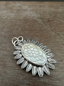 Carved Mother of Pearl pendant