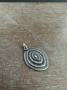 Layered silver eye pendant