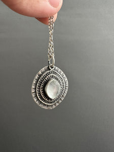 Layered silver and mother of pearl eye pendant