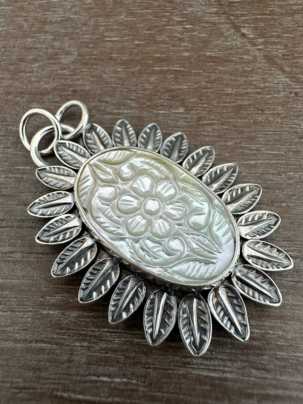Carved Mother of Pearl pendant