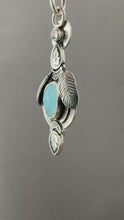 Load and play video in Gallery viewer, Icy blue feather pendant

