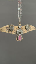Load and play video in Gallery viewer, Bronze and silver stamped bird pendant with pink garnet
