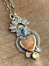 Load image into Gallery viewer, Fossilized coral sacred heart pendant
