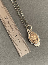 Load image into Gallery viewer, Our Lady of Guadeloupe bronze and silver single charm

