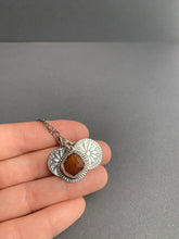 Load image into Gallery viewer, Raw garnet crystal with two “coin” charms
