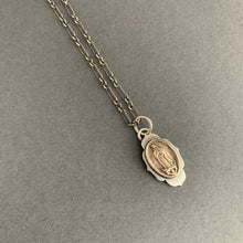 Load image into Gallery viewer, Our Lady of Guadeloupe bronze and silver single charm
