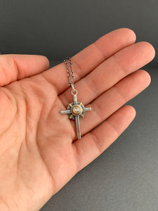 Small moissanite and gold cross