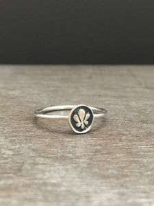 Abstract leaf stacking ring