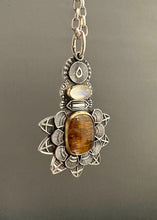 Load image into Gallery viewer, Cacoxenite and moonstone set in 22k gold medallion
