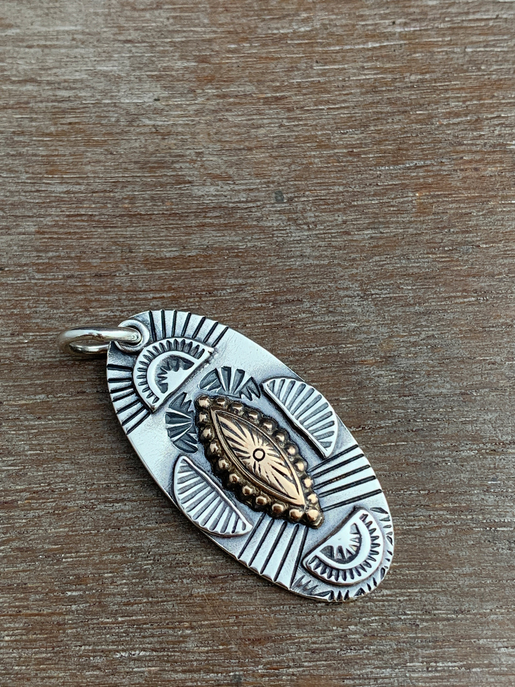 Sterling silver bronze eye pendant