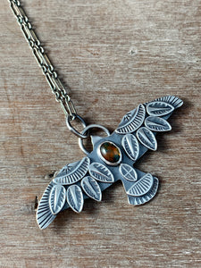 Moss agate bird pendant.