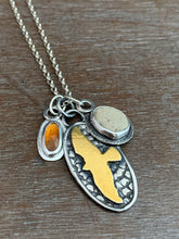 Load image into Gallery viewer, Garnet and beach stone with a gold hawk charm collection
