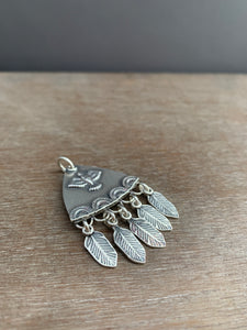 Sterling silver bird with dangly feathers pendant