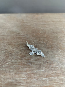 Small stamped bird pendant