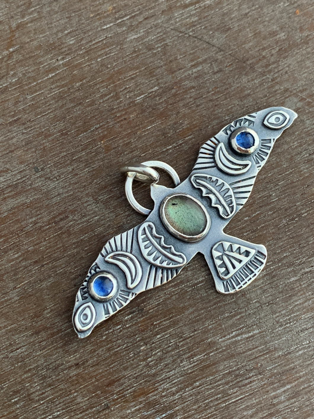Large labradorite and kyanite stamped bird pendant