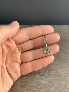 Tiny butterfly charm
