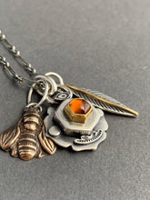 Load image into Gallery viewer, Honey comb charm necklace, Hessonite garnet set in 22k gold, with a bronze bee, and feather with an 18k gold accent
