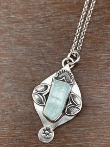 Aquamarine “ice” crystal charm pendant