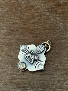 Small lion and moonstone pendant