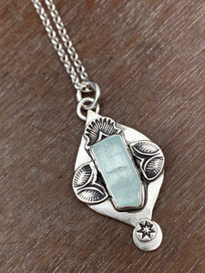 Aquamarine “ice” crystal charm pendant