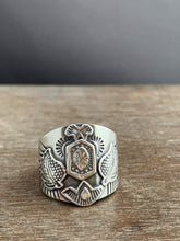 Load image into Gallery viewer, Large size 7.5 winged sacred symbol shield ring
