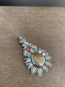 Sapphire and garnet pendant