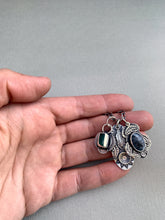 Load image into Gallery viewer, Sterling silver feather and sun charm, dendritic agate antler charm, and apatite charm
