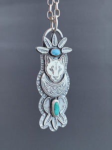 Mountain lion turquoise pendant