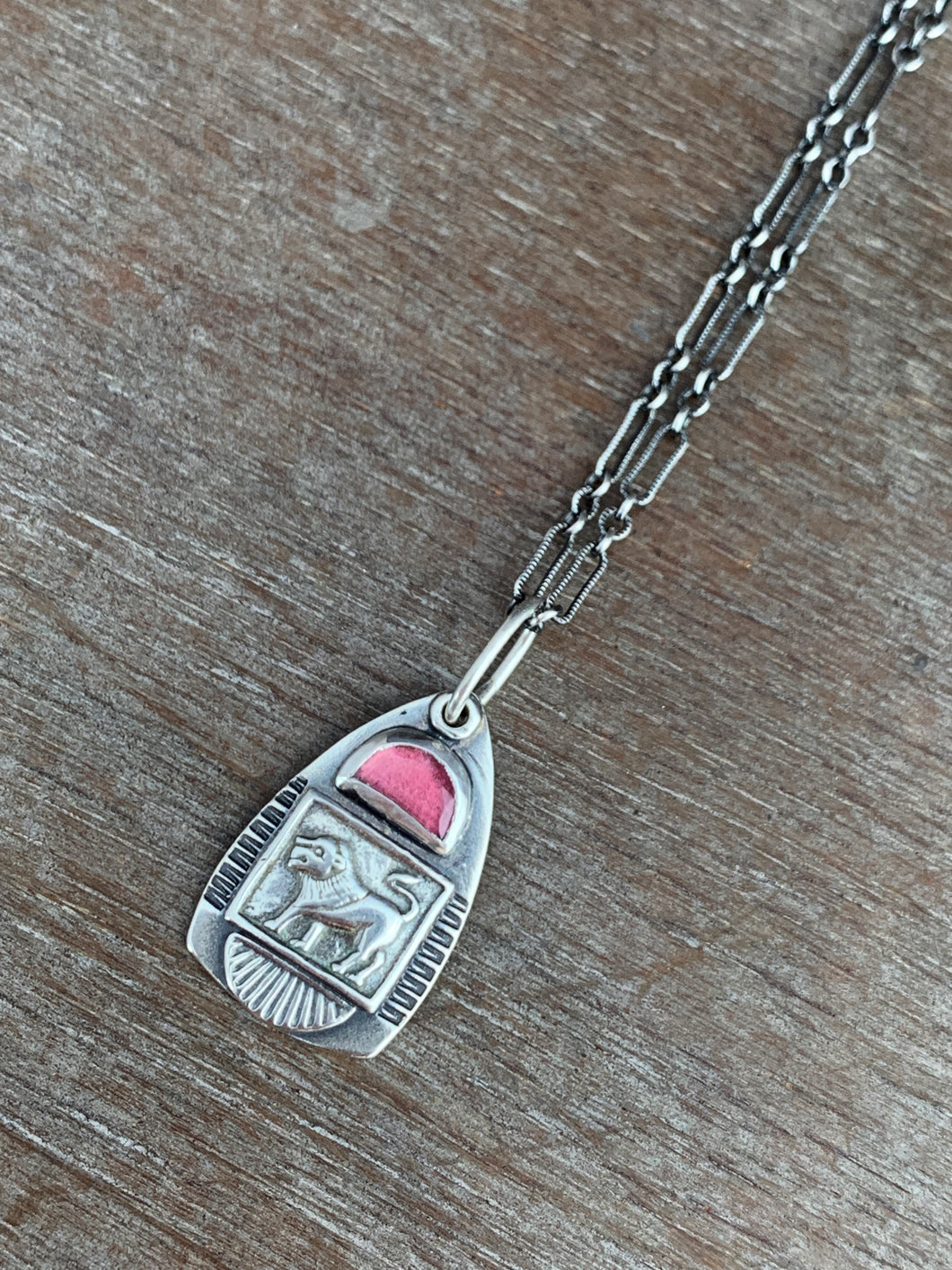 Garnet lion charm necklace