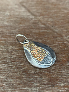 Silver and gold fish charm