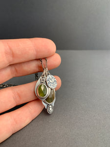 Sapphire and vesuvianite charms with a leaf “coin” accent charm